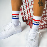 red, white and blue dazed socks with white shoes