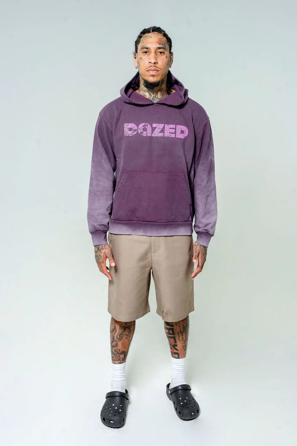 Two-tone purple hoodie with a prominent maroon Dazed logo.